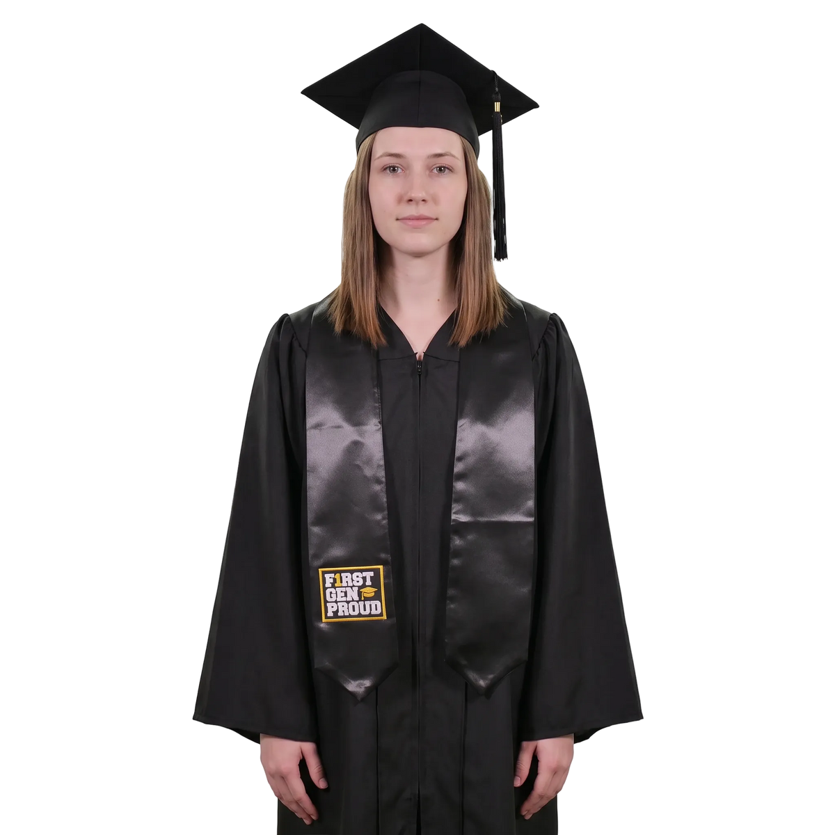 Graduate in a black cap and gown wearing a black First Gen Proud graduation stole with white lettering, a gold graduation cap design, and a gold rectangular border on one side.
