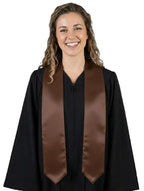 Plain brown graduation stole with pointed ends displayed on a wooden hanger against a white background.
