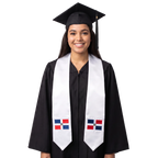 White graduation stole with embroidered Dominican Republic flag patches on both sides, featuring red and blue quarters, a white cross, a central coat of arms, and pointed ends.
