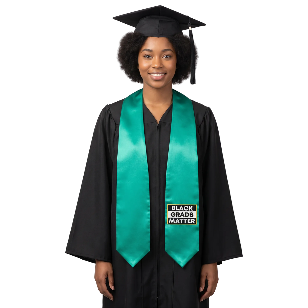 Emerald green graduation stole with “BLACK GRADS MATTER” lettering in a black and white rectangular design outlined in gold on one side and pointed ends.
