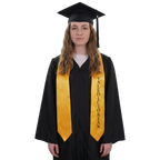 Graduate in a black gown wearing a gold Valedictorian graduation stole with vertical black lettering on one side and pointed ends, holding a rolled diploma.
