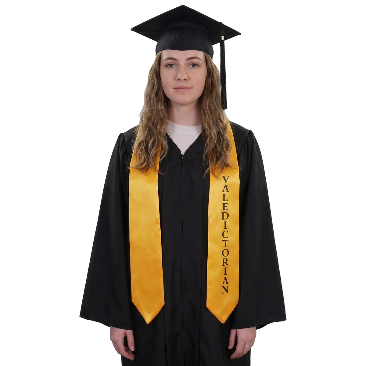 Graduate in a black gown wearing a gold Valedictorian graduation stole with vertical black lettering on one side and pointed ends, holding a rolled diploma.
