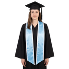 Graduate wearing a light blue graduation stole with white trim along the edges and slanted ends over a black graduation gown.
