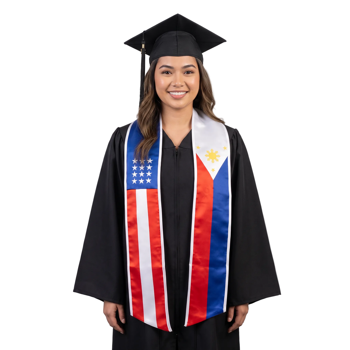 Graduate in a black cap and gown wearing a mixed USA and Philippines flag graduation stole, with American stars and stripes on one side and the Philippine flag’s sun, stars, and red and blue
