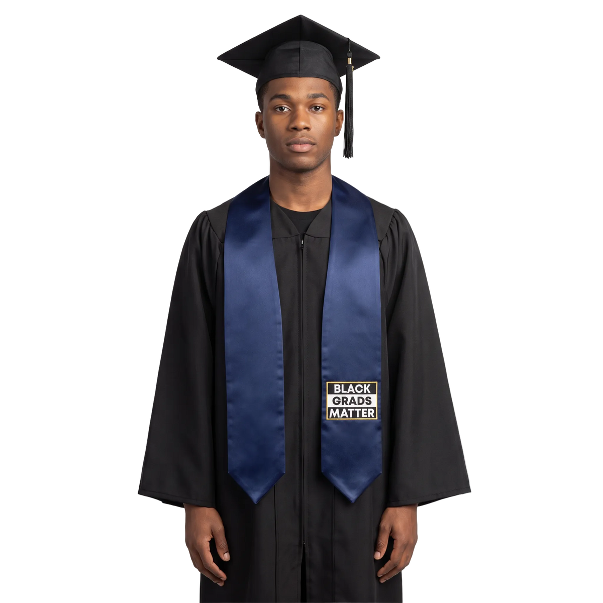 Navy blue graduation stole with “BLACK GRADS MATTER” lettering in a black and white rectangular design outlined in gold on one side and pointed ends.
