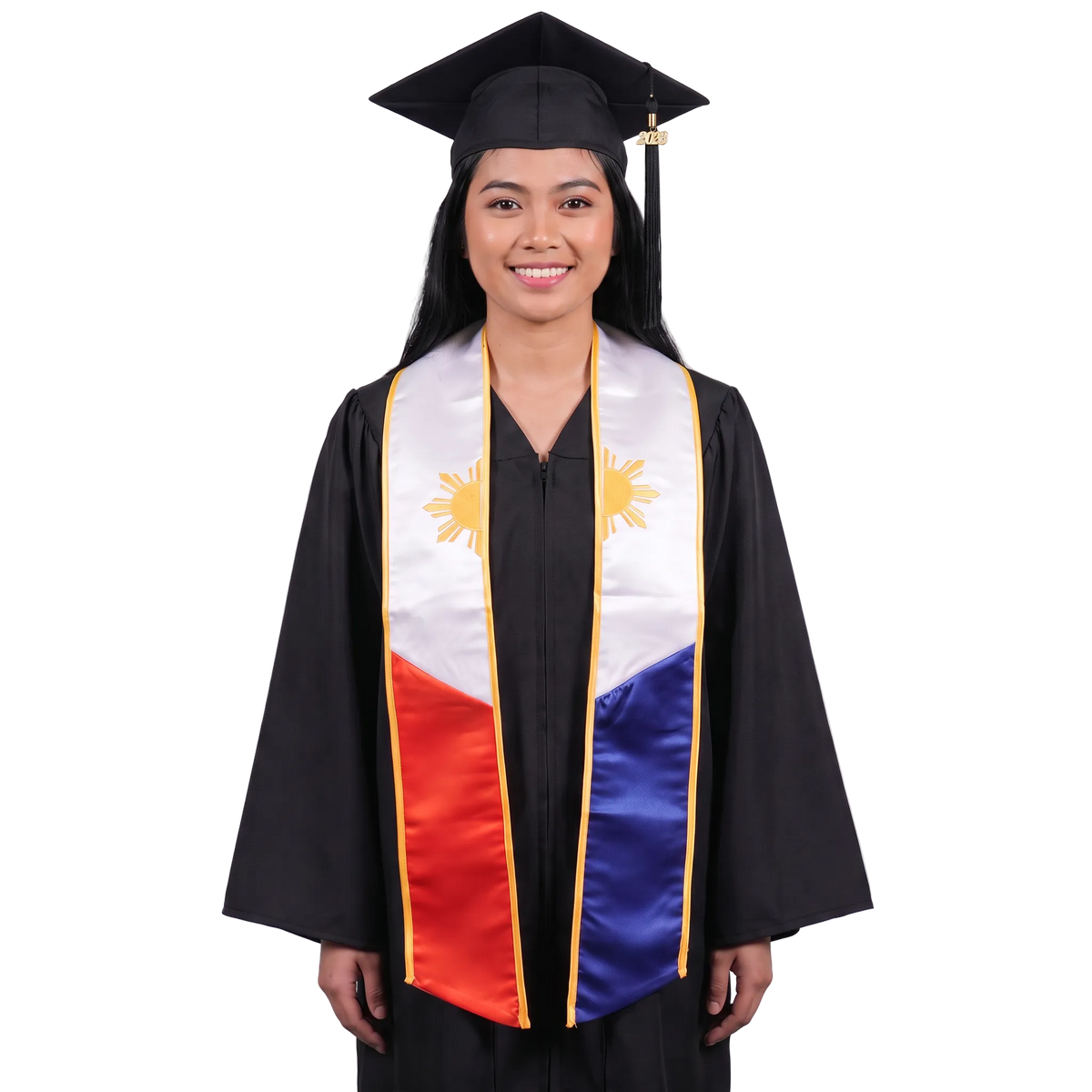 Graduate in a black cap and gown wearing a Philippines embroidered graduation stole with white upper panels, gold sun designs and trim, and red and blue lower panels.
