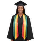Graduate in a black cap and gown wearing a Senegal flag graduation stole with green, yellow, and red vertical stripes, a green star on one side, and pointed ends.
