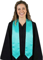 Graduate wearing a plain turquoise university and college graduation stole with pointed ends over a black graduation gown.
